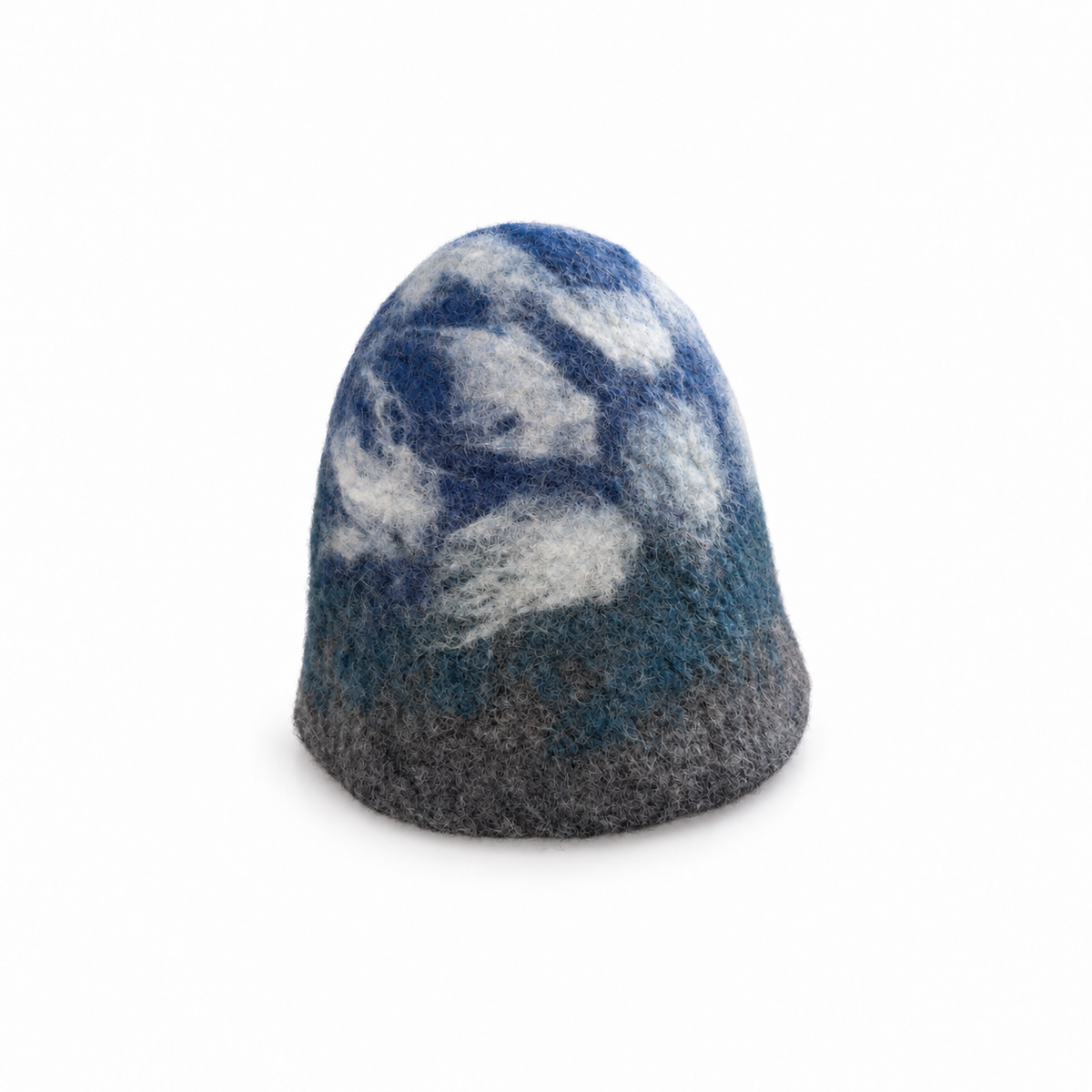 Hand-felted 100% wool sauna hat featuring a blue mountain landscape and white cloud design, shown at an angle on a white background