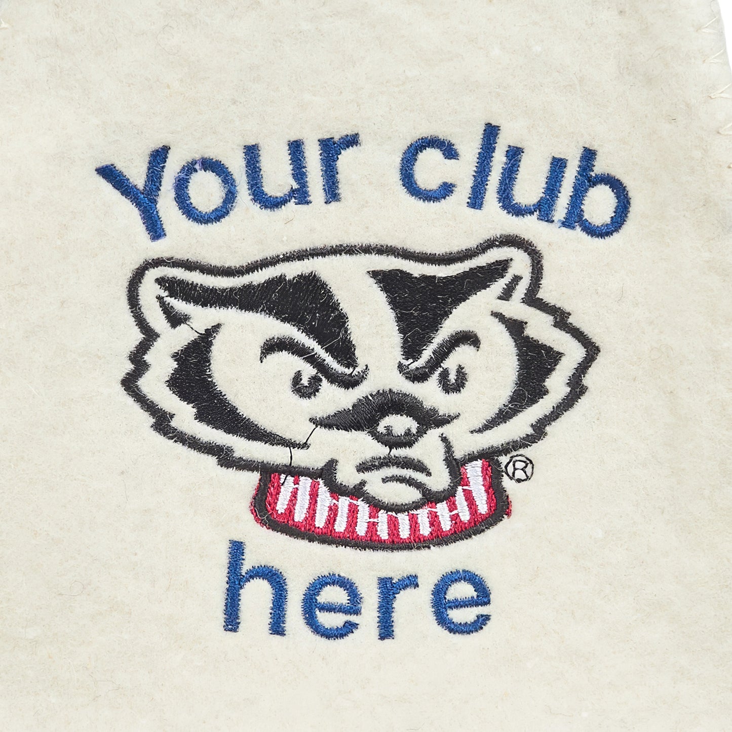 Close-up of custom logo embroidery on white wool sauna hat