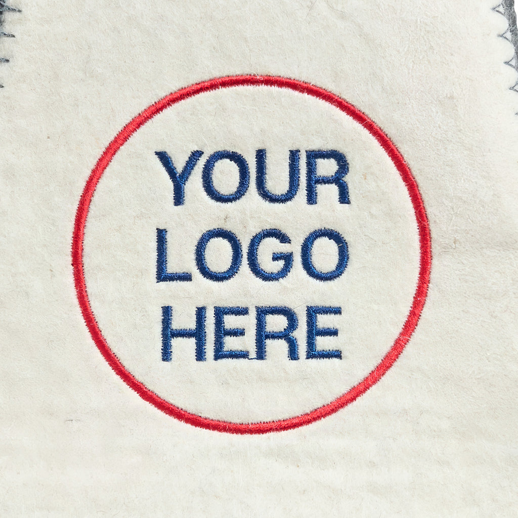 embroidered Your Logo Here design inside a red circle on a felt sauna hat