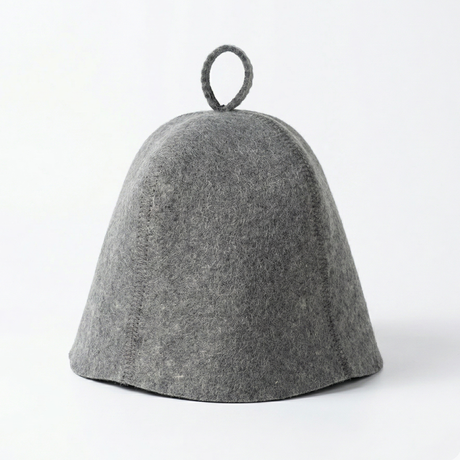 Gray wool sauna hat with deep bell shape and loop handle on top, shown from the front on a light background.