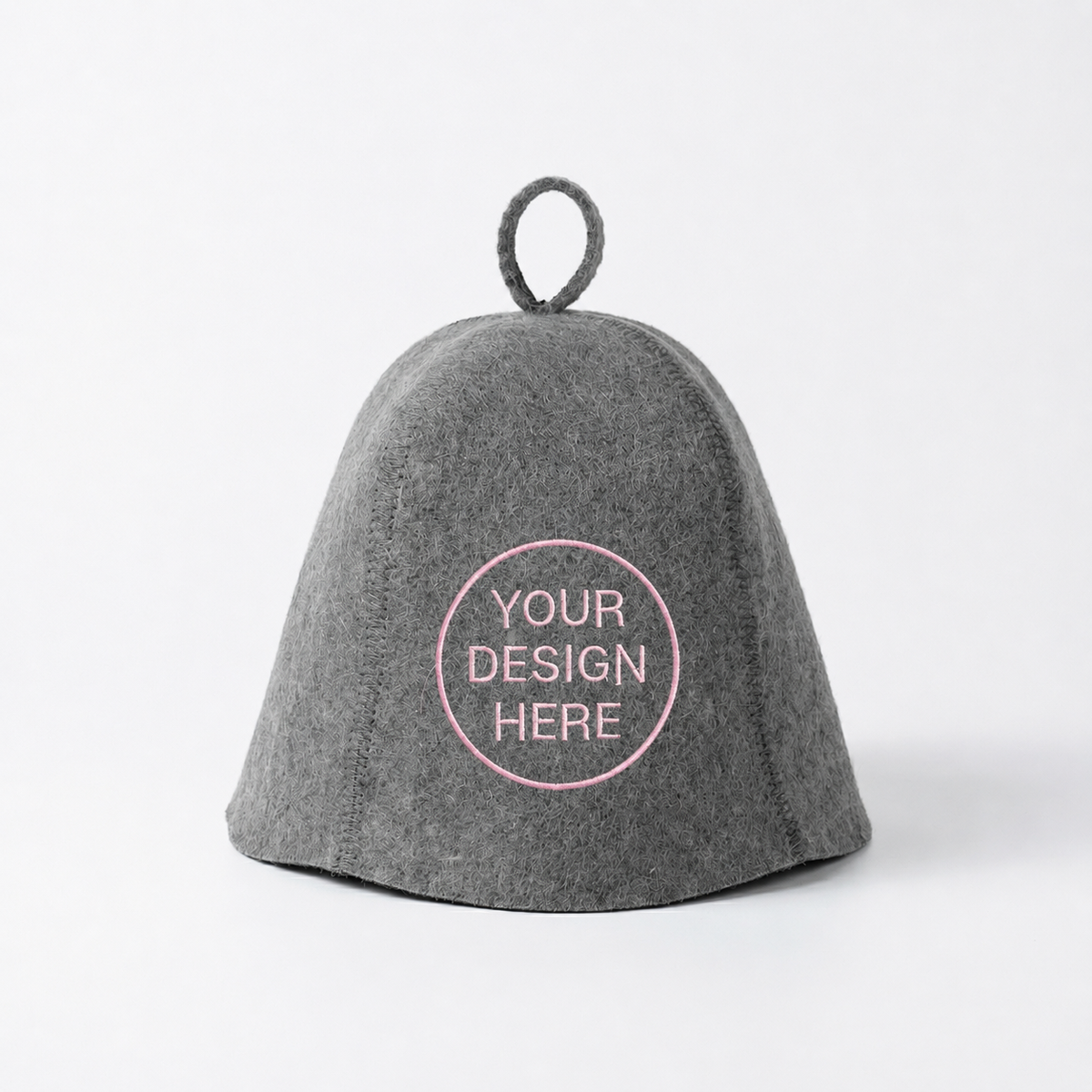 Gray wool sauna hat with loop handle and pink circle custom embroidery placeholder on the front, shown isolated on a white background