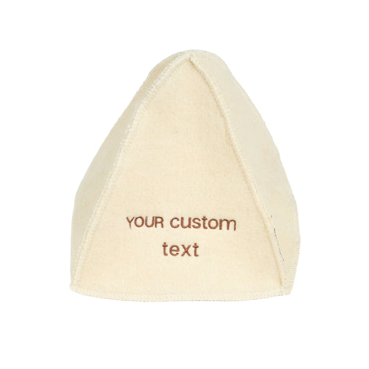 White wool felt sauna hat with brown custom text embroidery displayed on a white background and personalized lettering on the front.