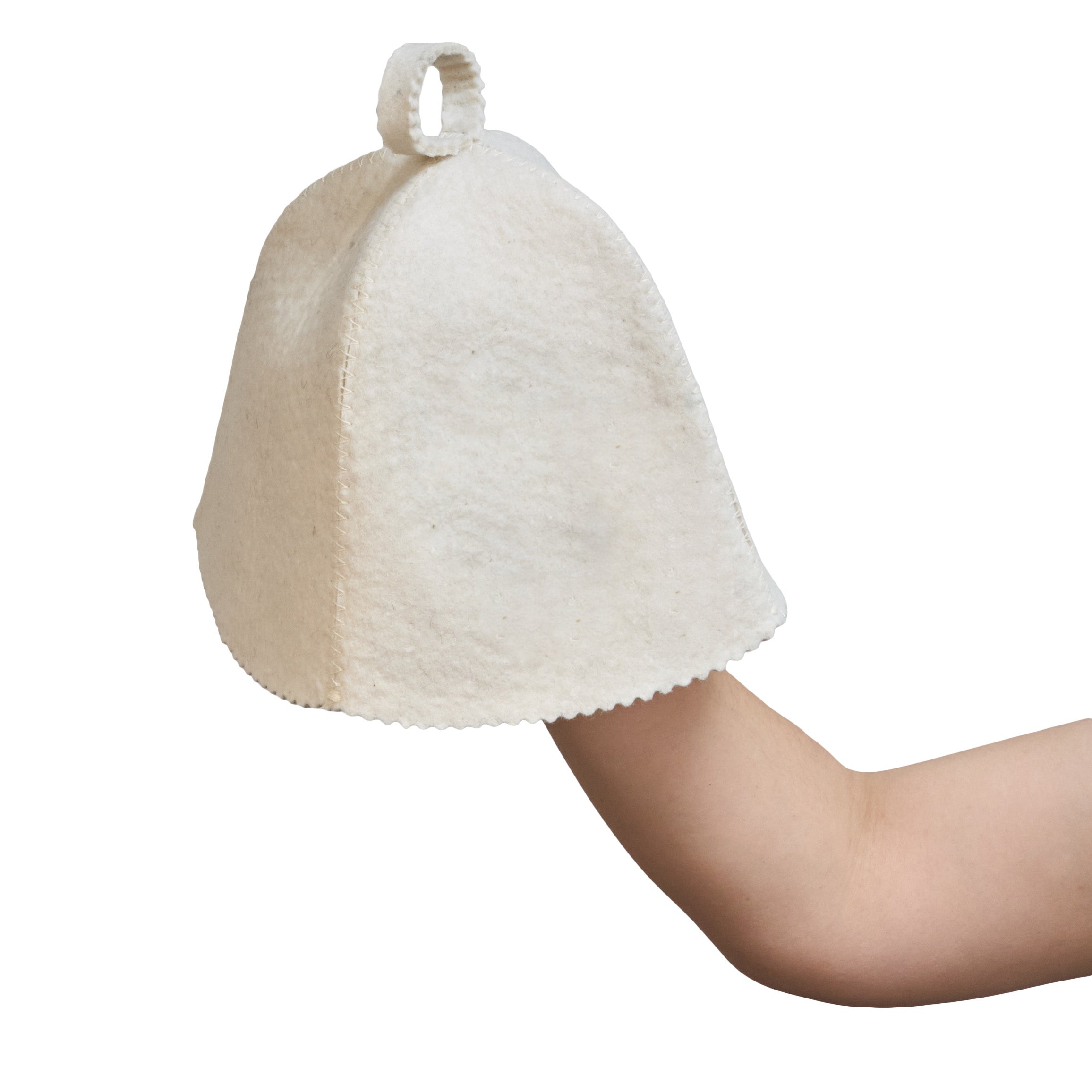 white sauna hat on woman's hand