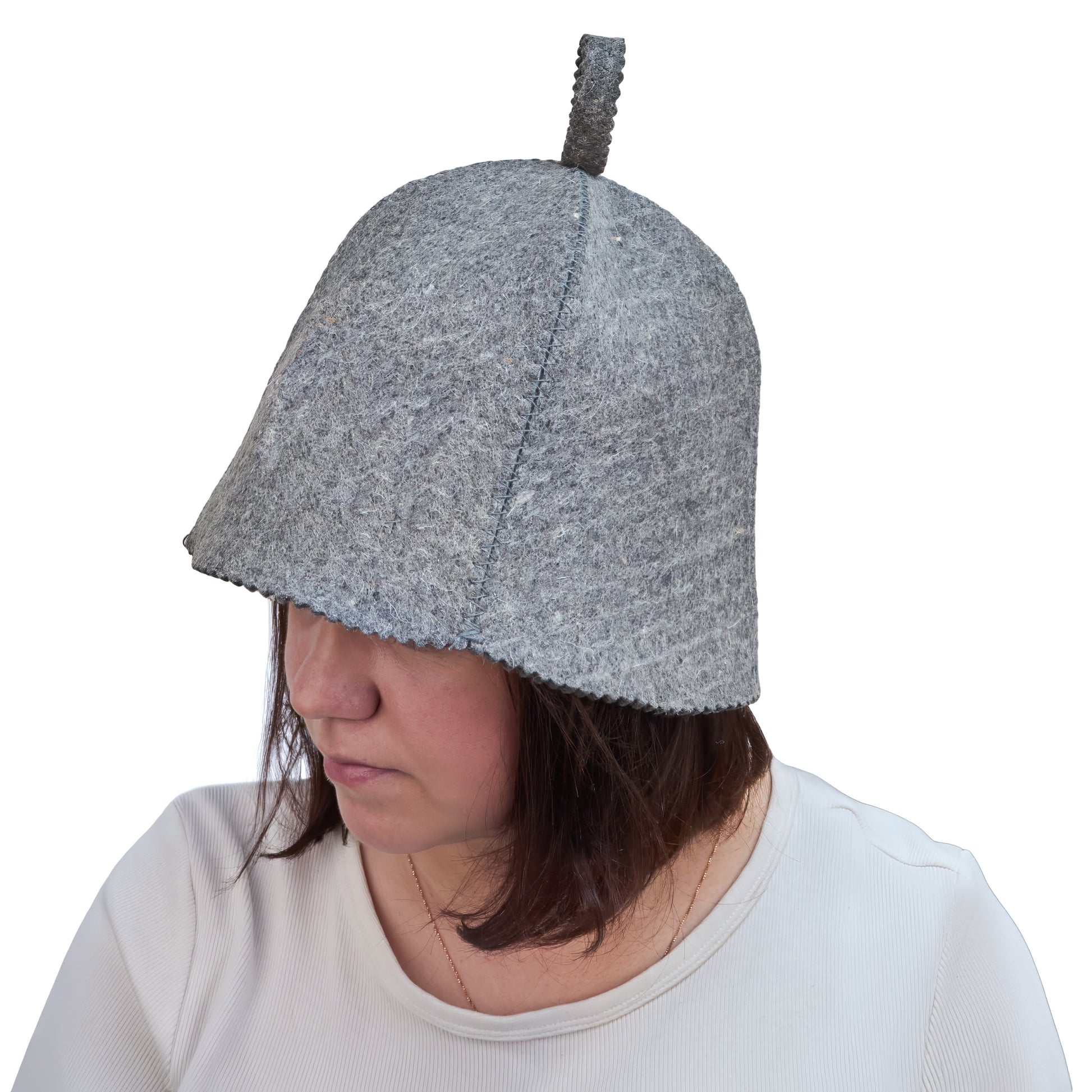 woman wearing a gray sauna hat with a loop on a white background