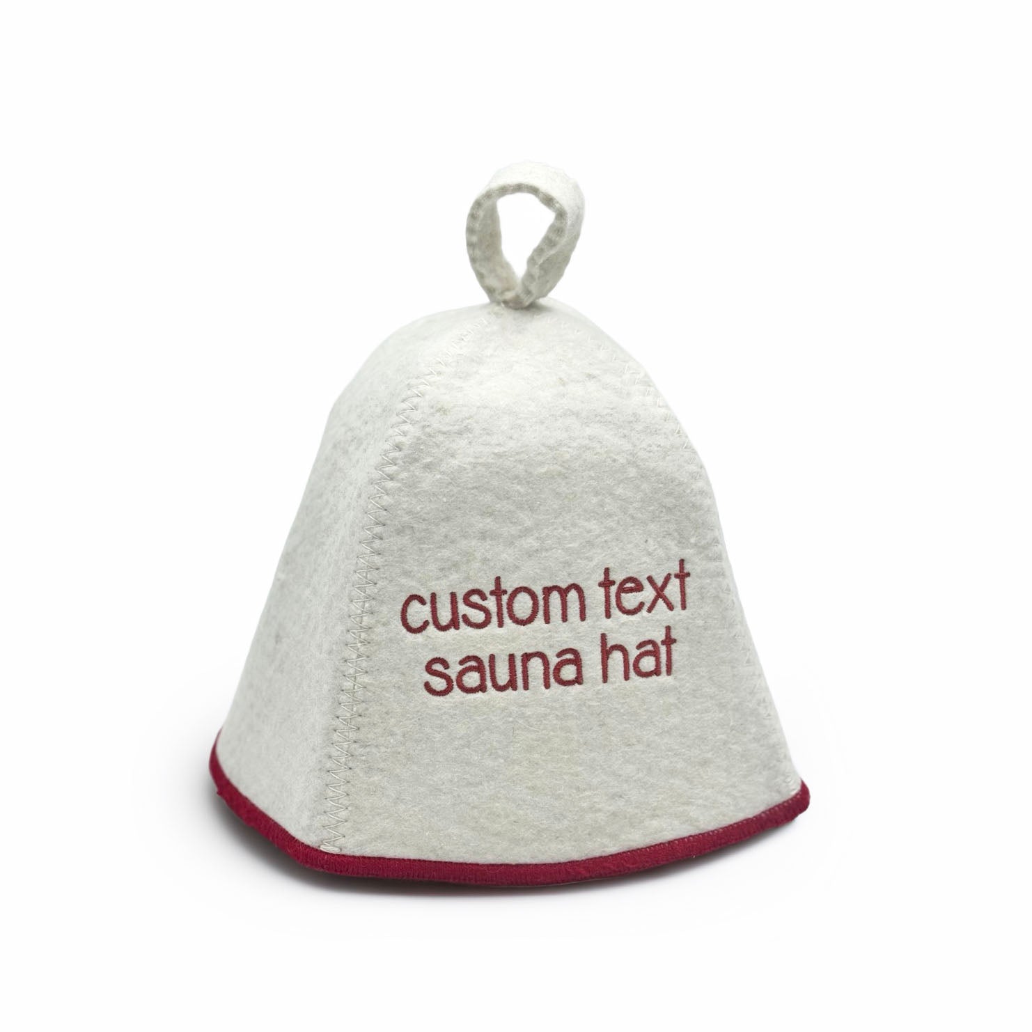 White sauna hat with red text embroidered